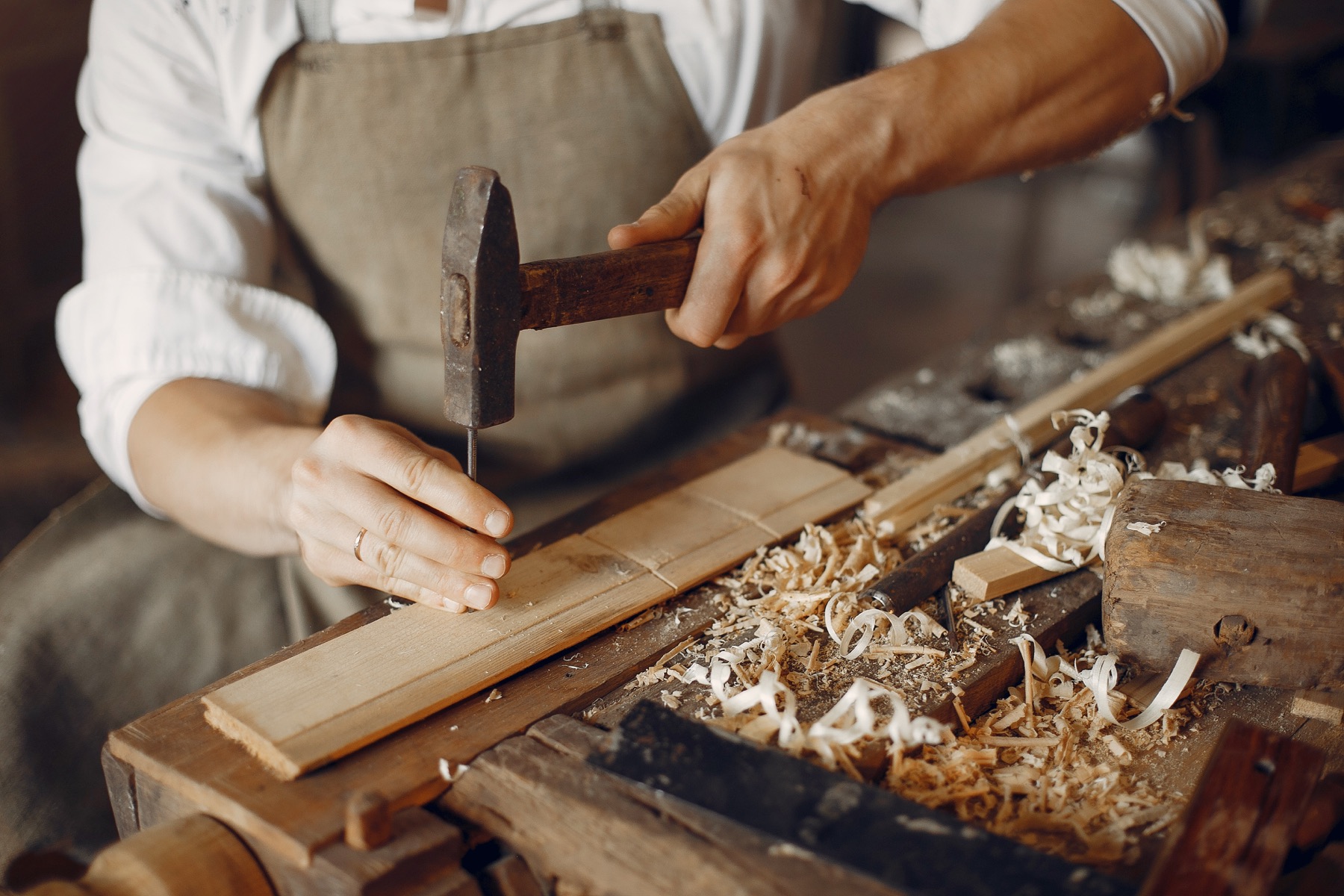 Carpenter working with wood